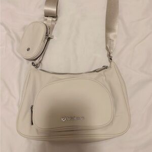 lululemon athletica Off-White Crossbody Bag with a small pouch